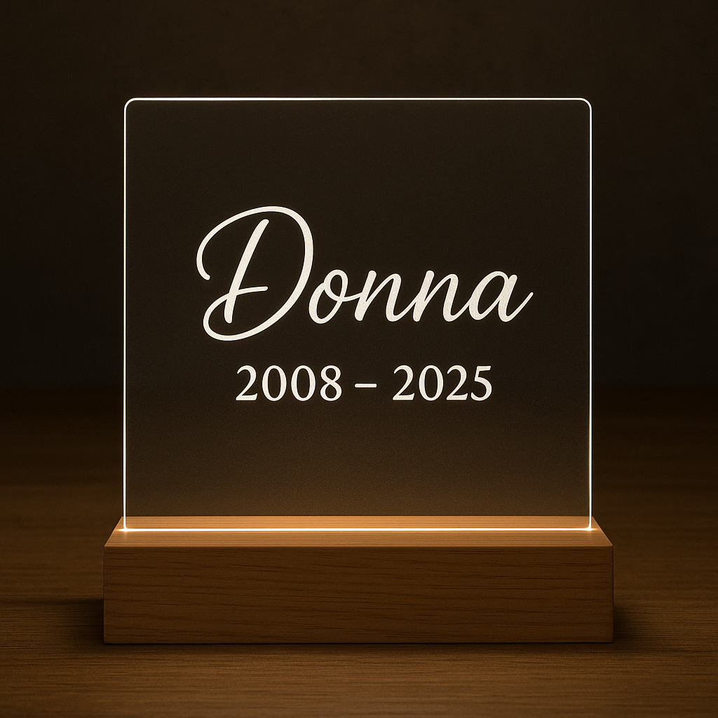 Verlicht gedenkplaatje hond